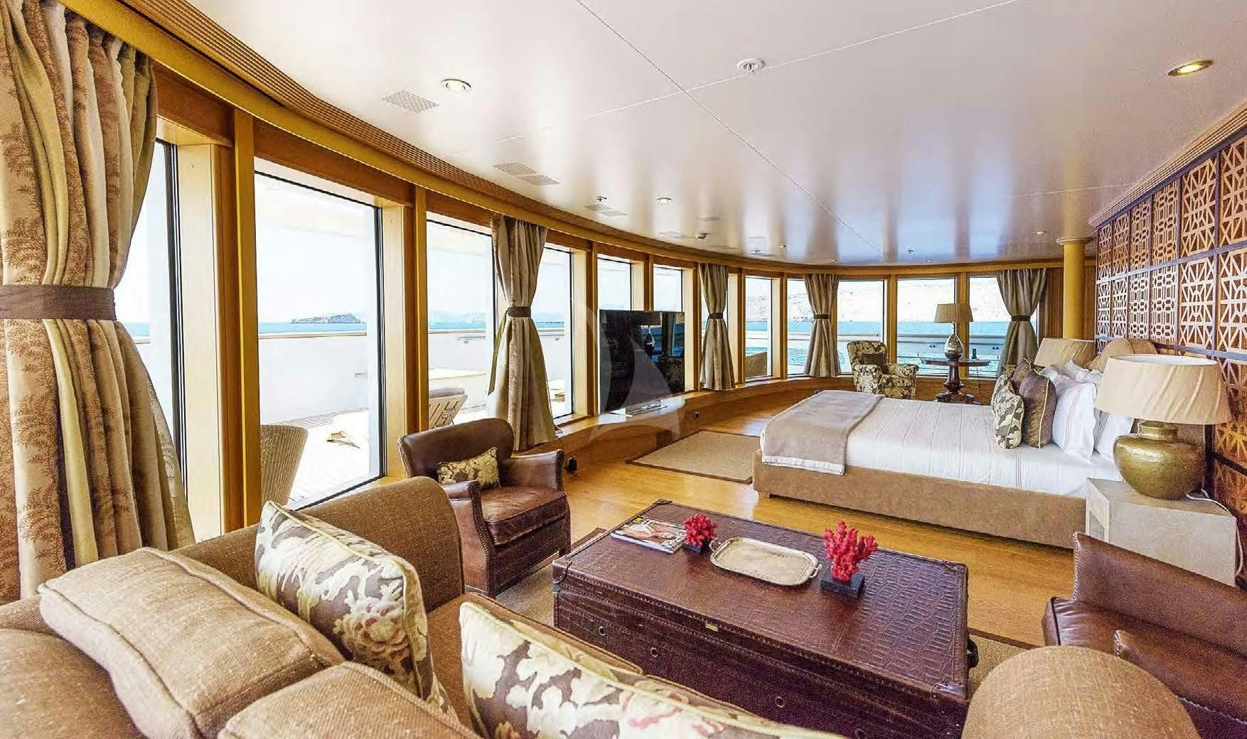 a living room with a large window aboard BOADICEA Yacht for Sale