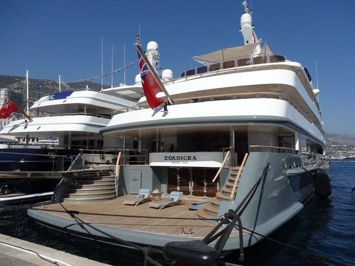 a large white boat docked aboard BOADICEA Yacht for Sale