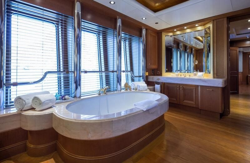 a bathroom with a large tub aboard BOADICEA Yacht for Sale
