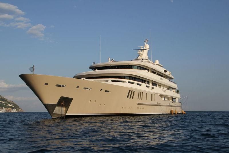 a large white ship in the water aboard BOADICEA Yacht for Sale