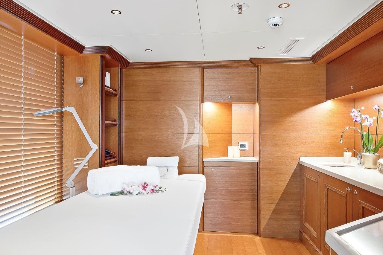 a modern bathroom with a bed aboard BOADICEA Yacht for Sale