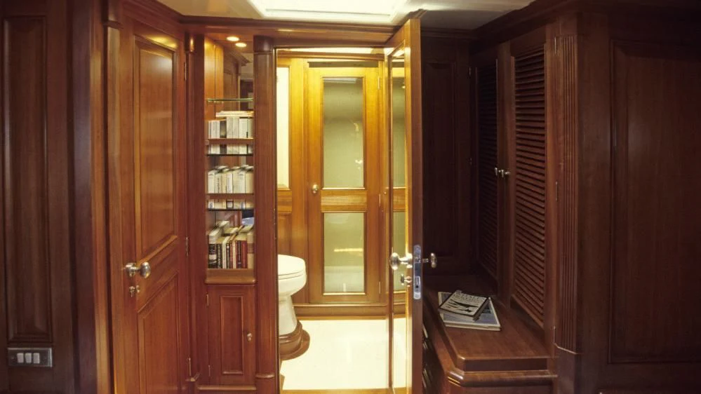 a room with wooden cabinets aboard FOFTEIN Yacht for Sale