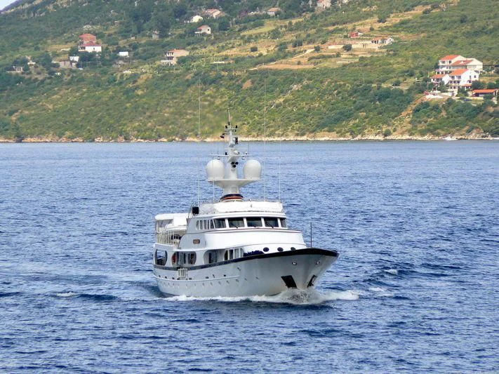a white boat on the water aboard A AND A Yacht for Sale