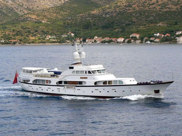 a white boat on the water aboard A AND A Yacht for Sale