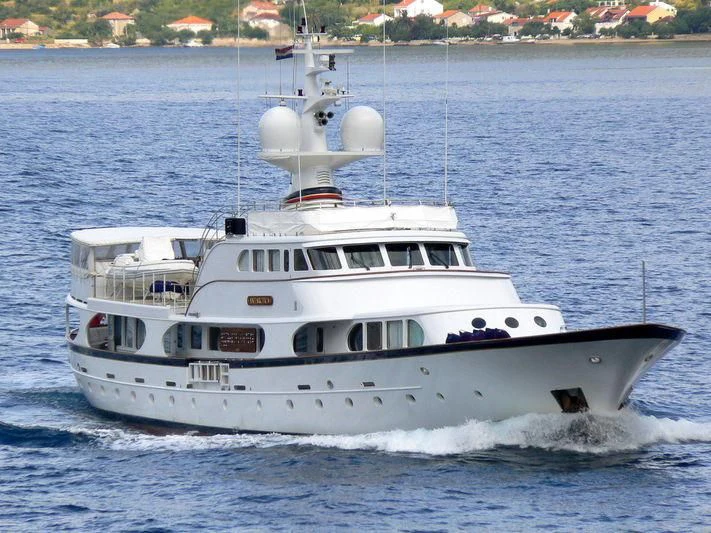 a white boat on the water aboard A AND A Yacht for Sale