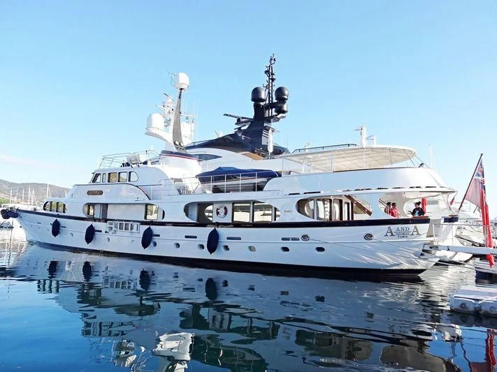 a large white boat in the water aboard A AND A Yacht for Sale