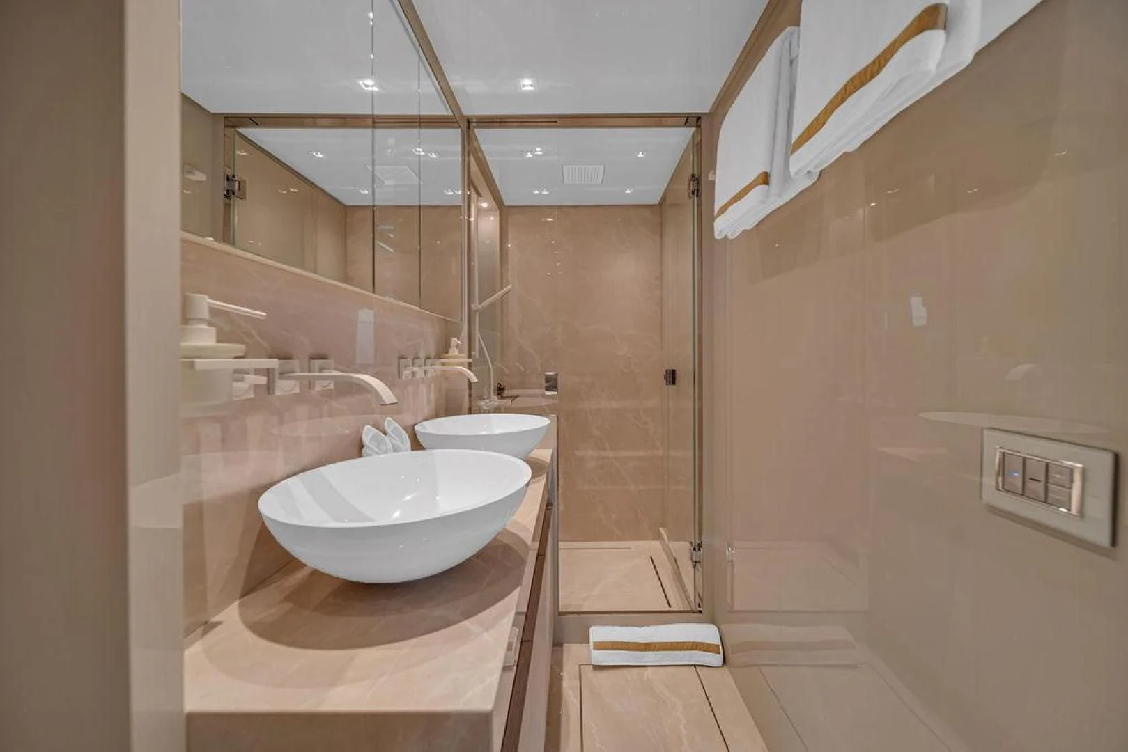 a bathroom with two sinks aboard JUJU Yacht for Sale