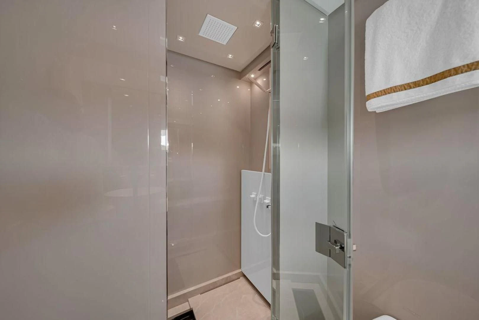 a bathroom with a shower and a sink aboard JUJU Yacht for Sale