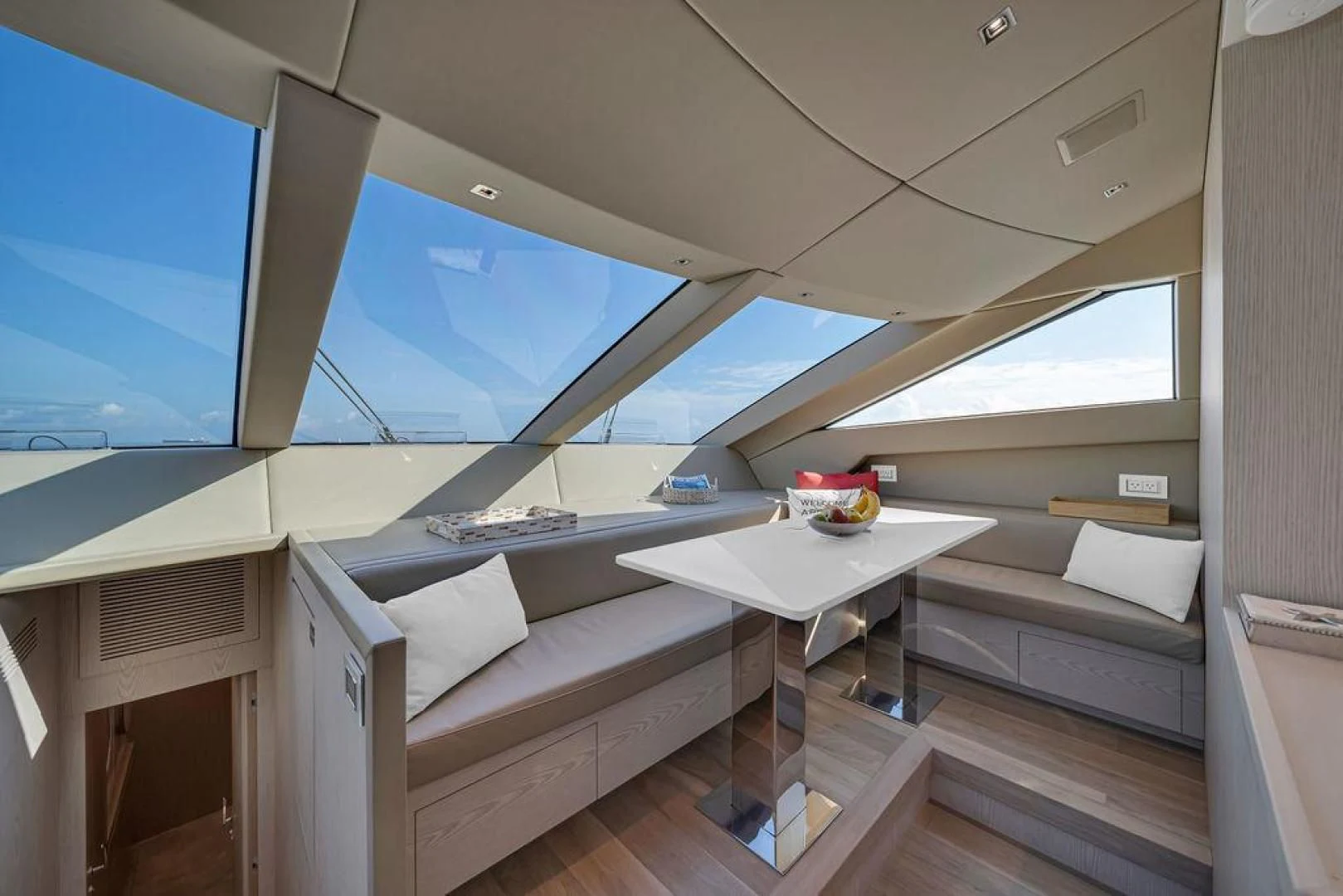 a room with a couch and a table aboard JUJU Yacht for Sale