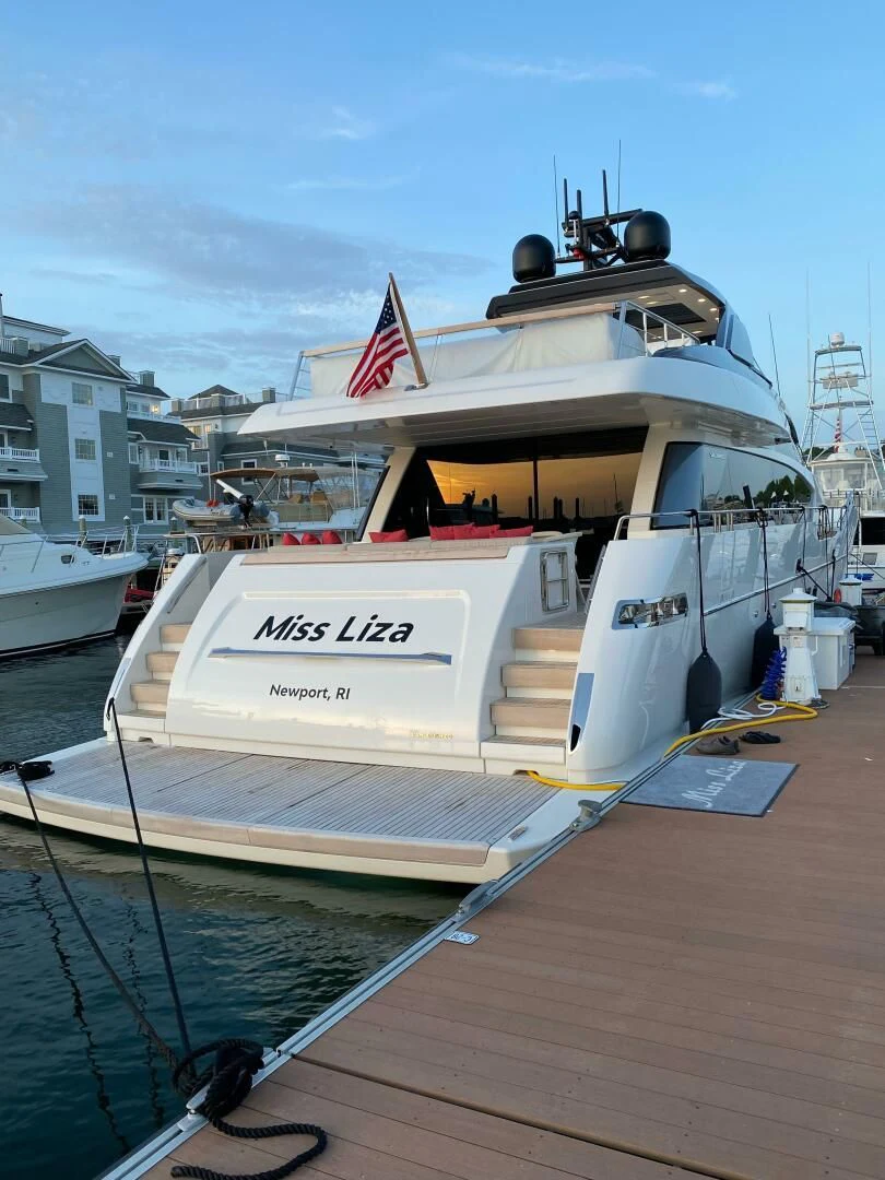 a boat docked at a pier aboard JUJU Yacht for Sale
