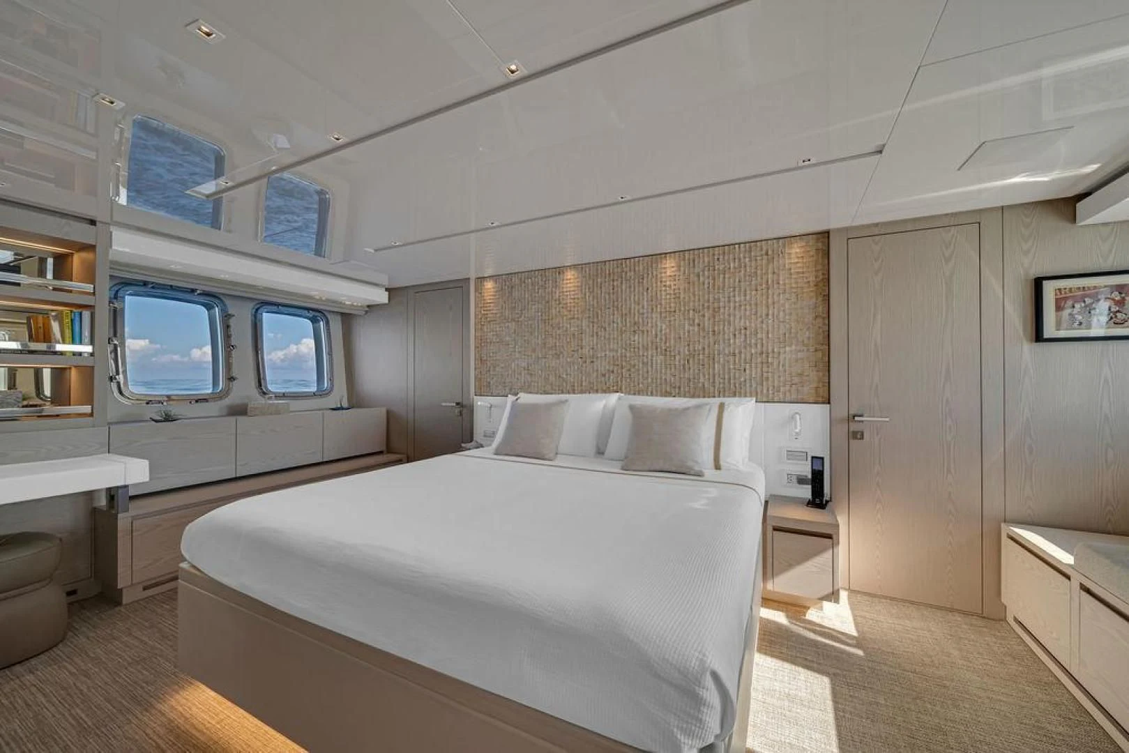 a room with a bed and a tv aboard JUJU Yacht for Sale