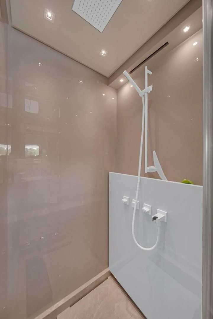 a shower with a glass door aboard JUJU Yacht for Sale