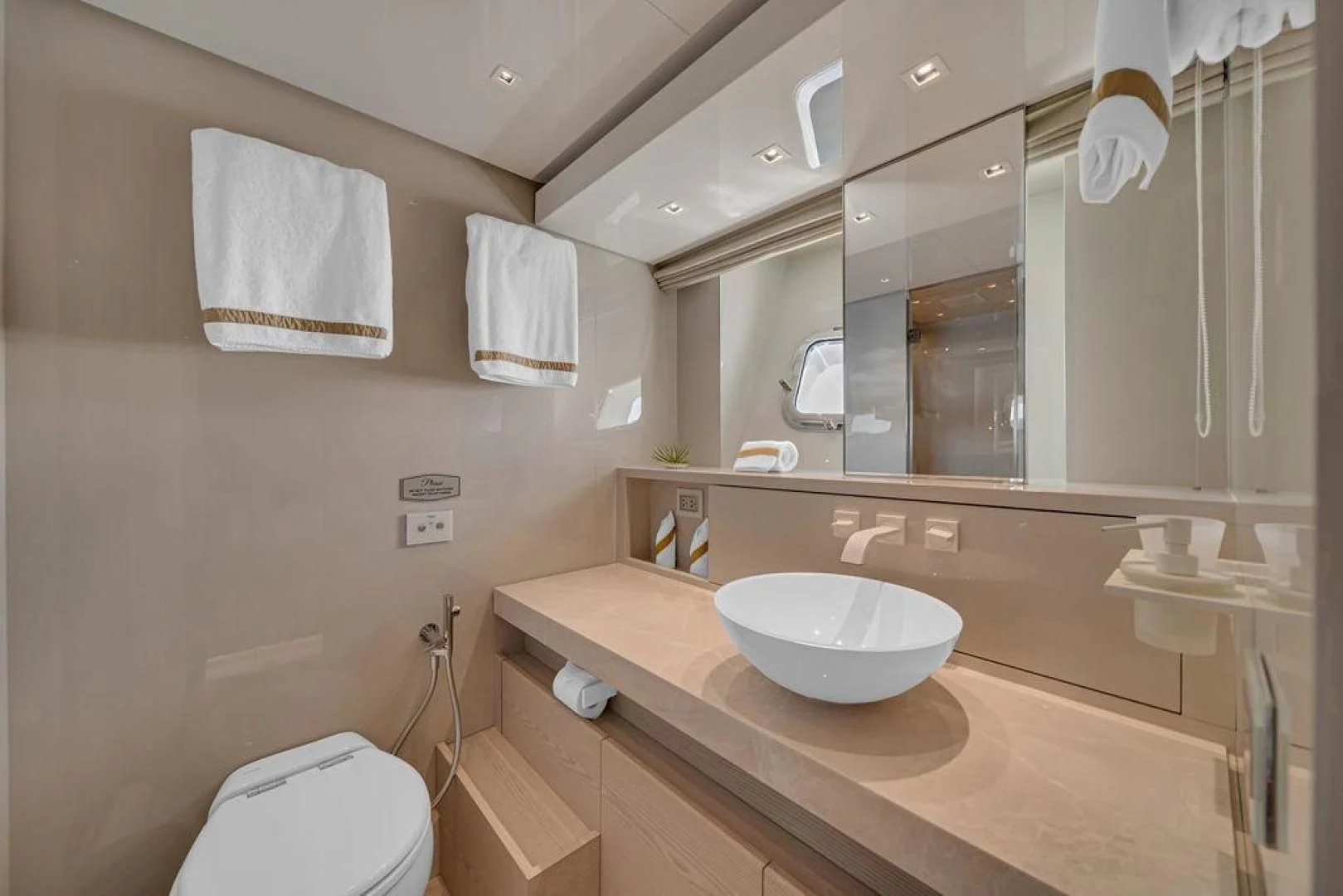 a bathroom with a sink and toilet aboard JUJU Yacht for Sale