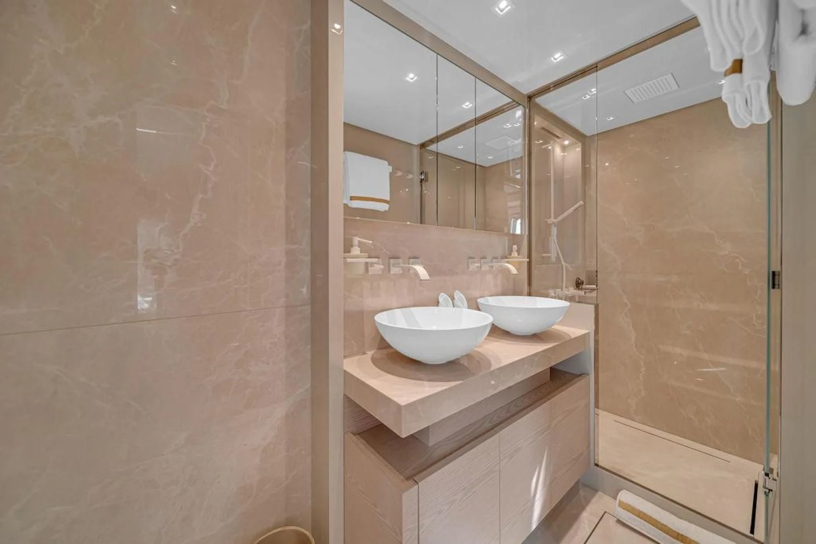 a bathroom with a sink and a shower aboard JUJU Yacht for Sale