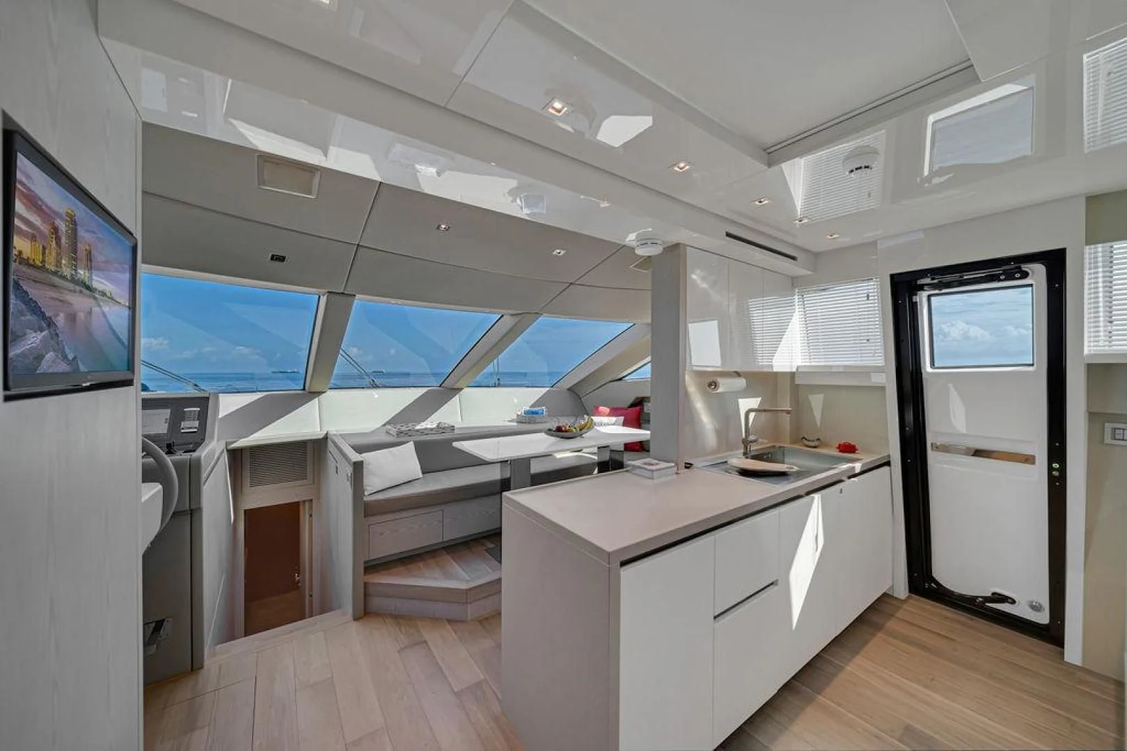 a room with a desk and a tv aboard JUJU Yacht for Sale
