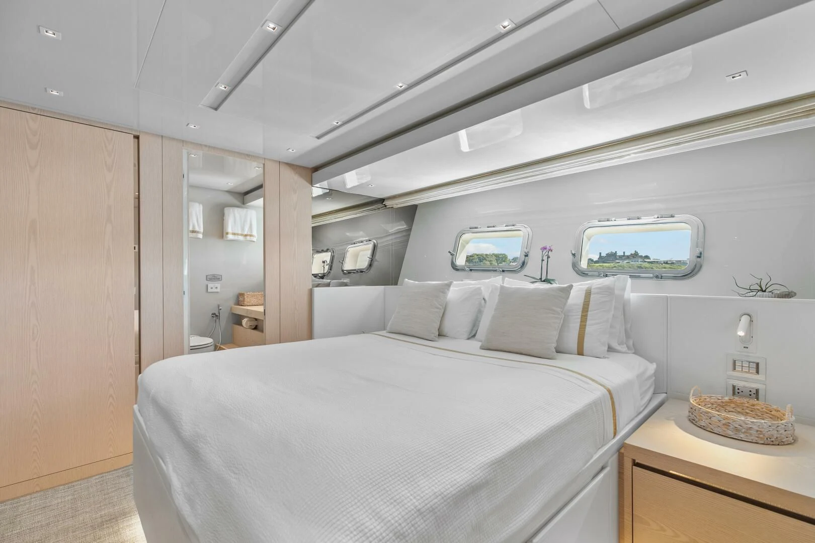 a room with two beds aboard JUJU Yacht for Sale