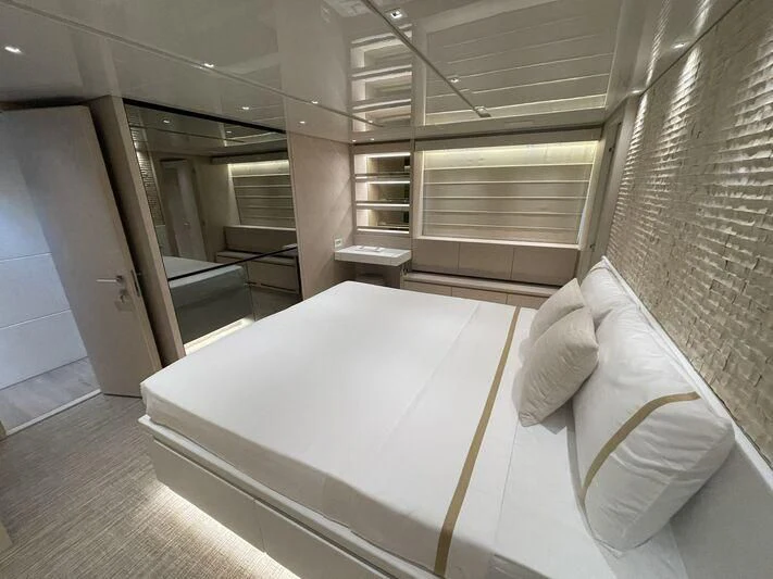 a bed in a room aboard JUJU Yacht for Sale