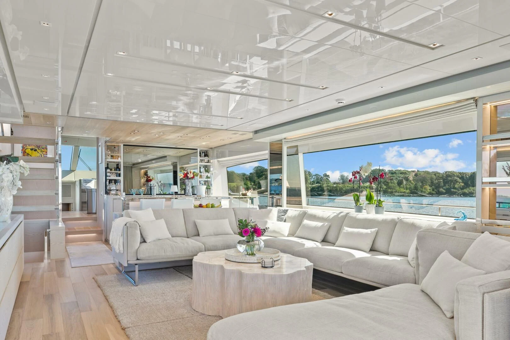 a living room with a large window aboard JUJU Yacht for Sale