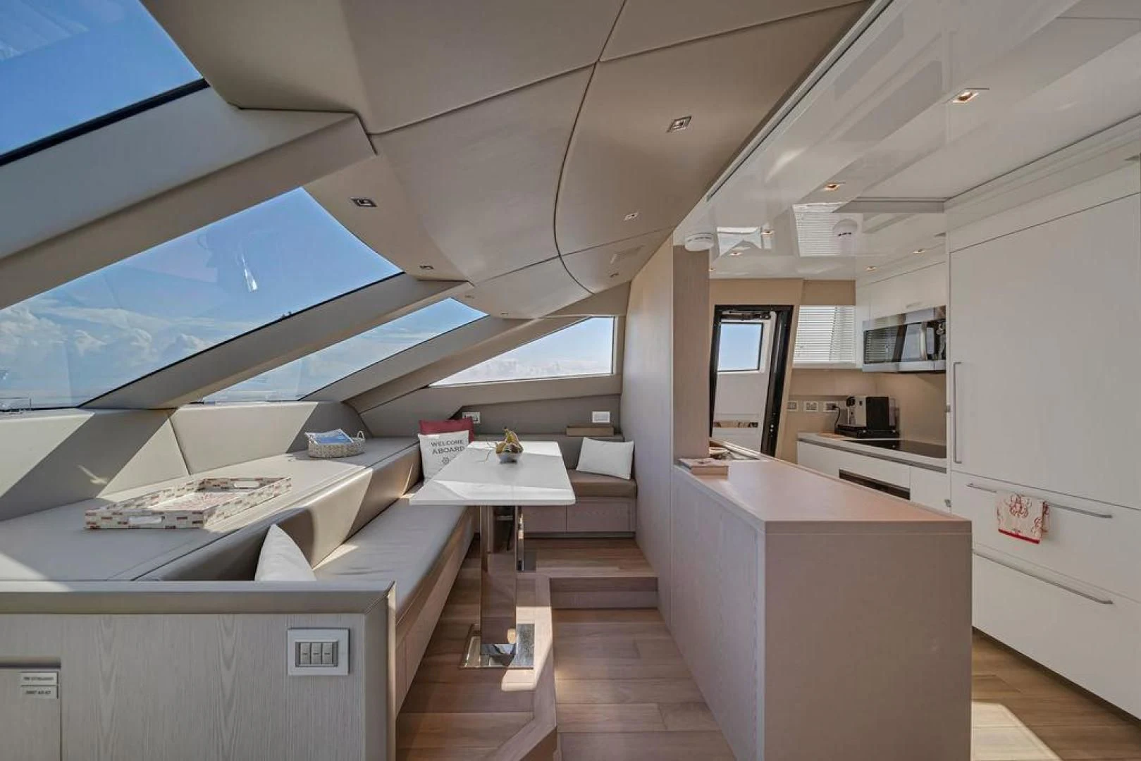 a room with a desk and a computer aboard JUJU Yacht for Sale