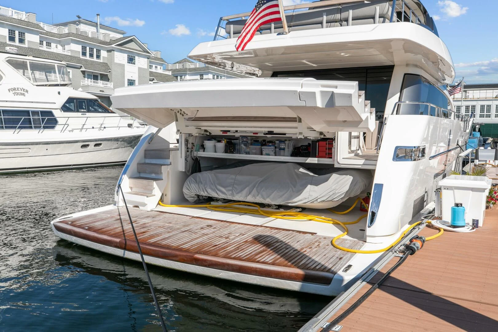 a boat docked at a pier aboard JUJU Yacht for Sale