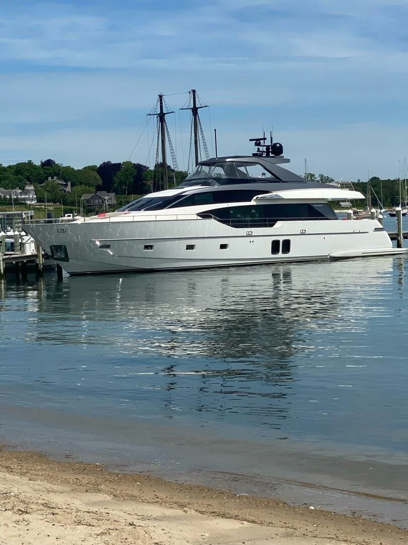 a white boat on the water aboard JUJU Yacht for Sale