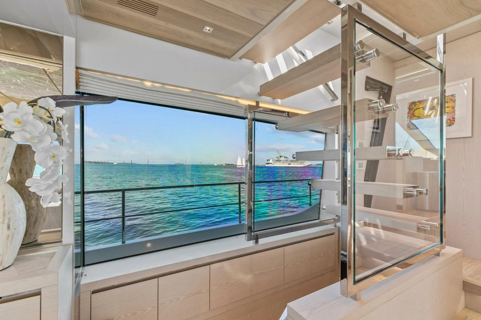 a room with a glass window aboard JUJU Yacht for Sale