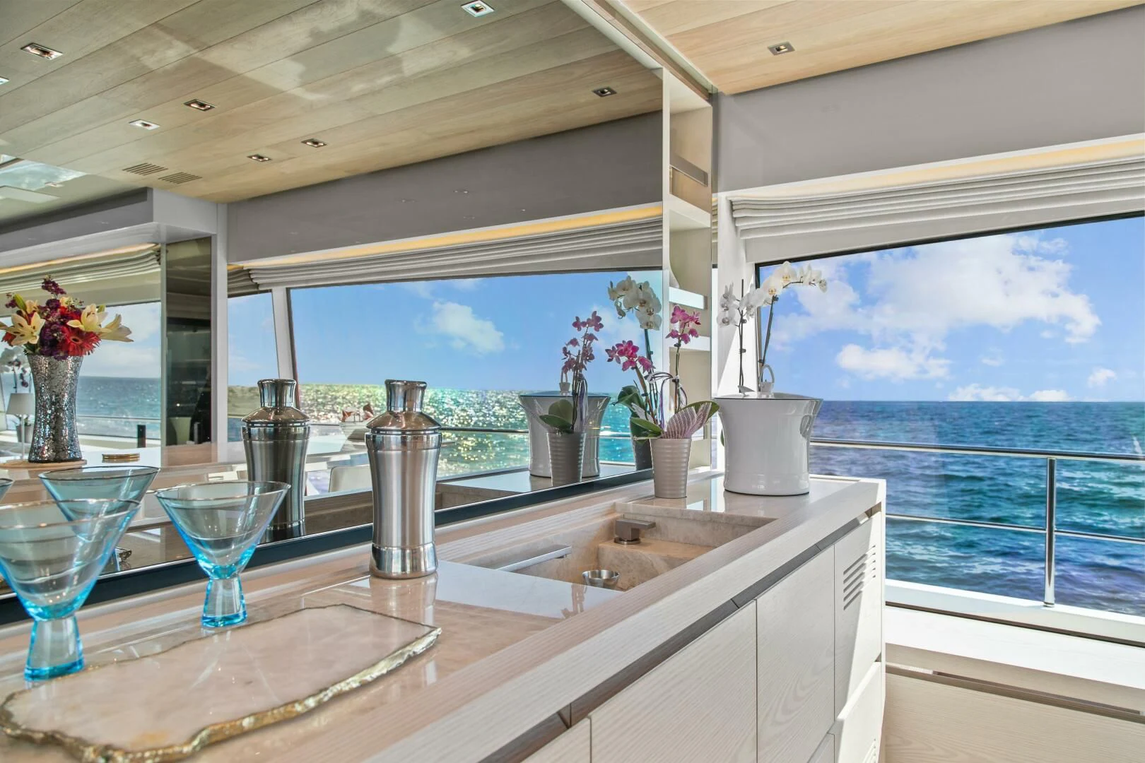 a kitchen with a sink and a window aboard JUJU Yacht for Sale