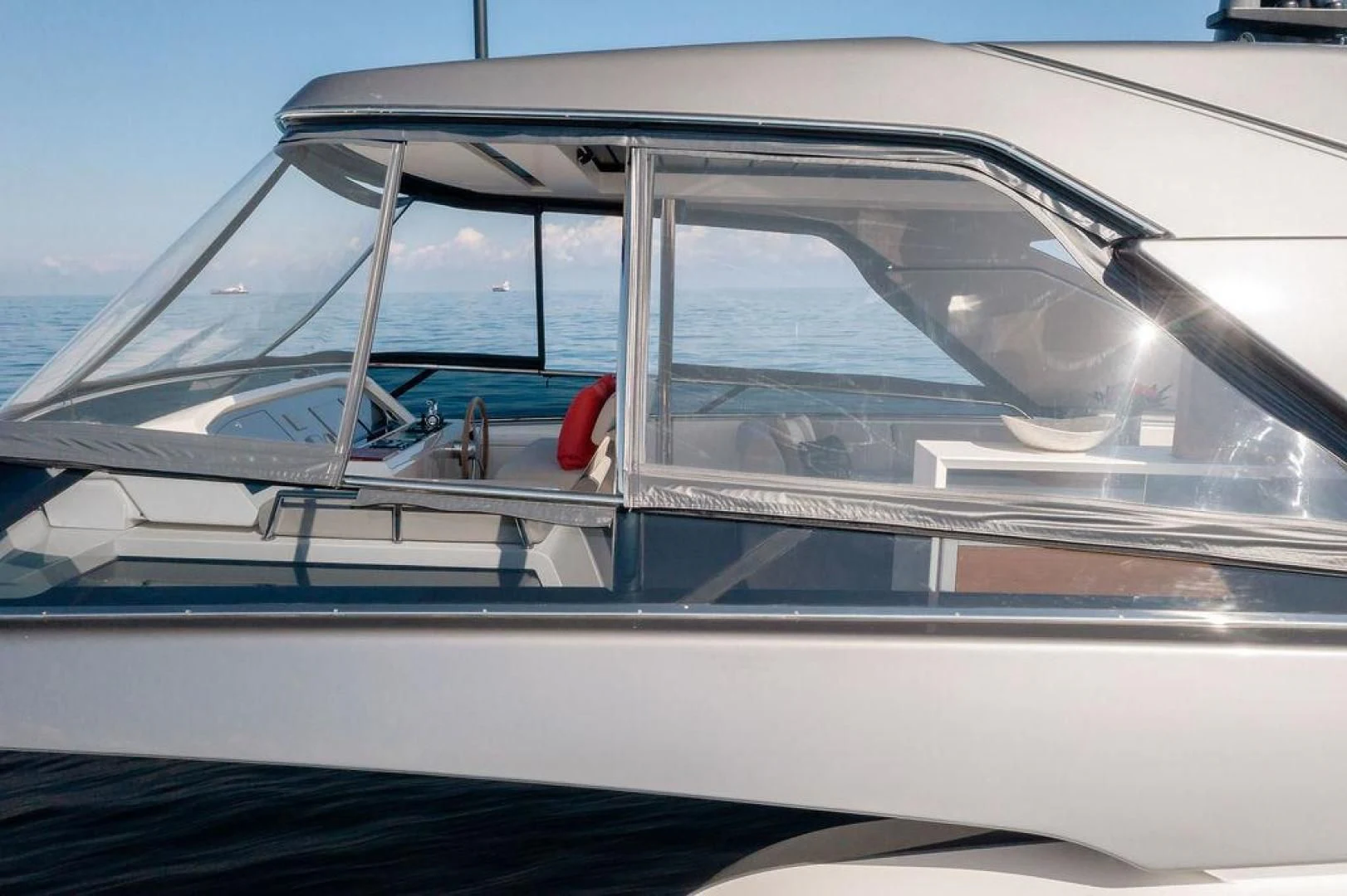a person sitting on a boat aboard JUJU Yacht for Sale