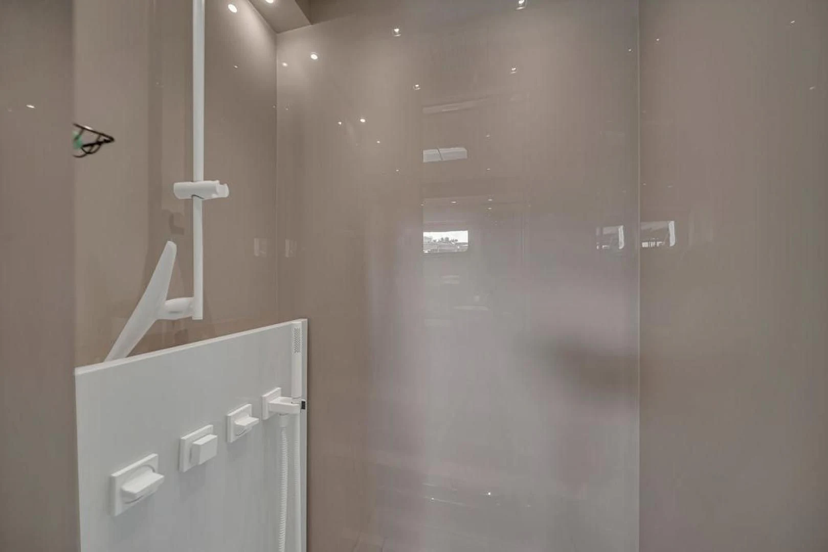 a shower with a glass door aboard JUJU Yacht for Sale