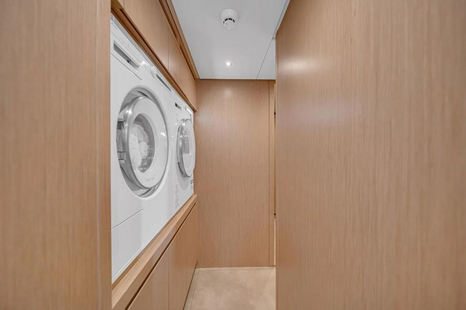 a white washing machine aboard JUJU Yacht for Sale