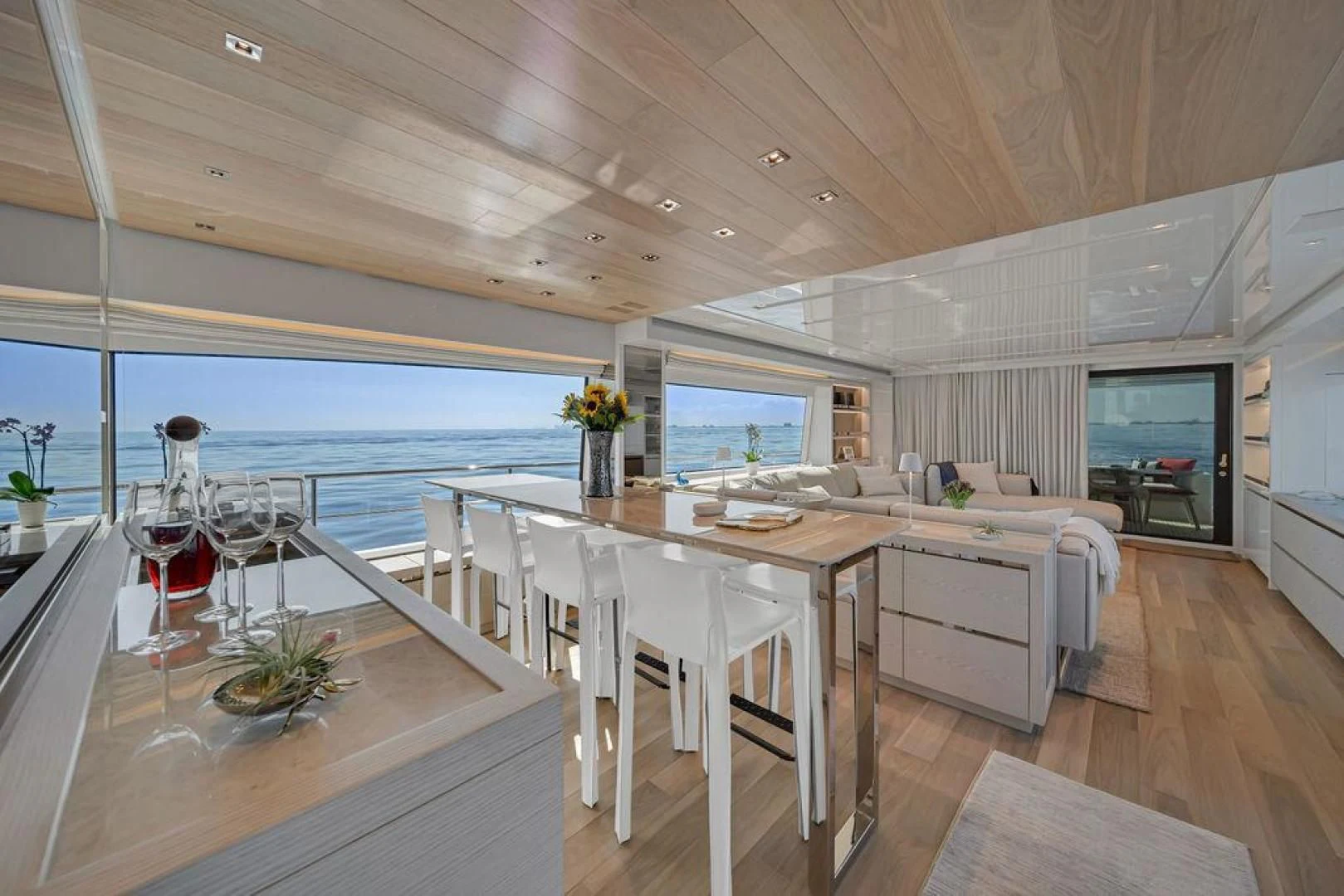 a large kitchen with a large table aboard JUJU Yacht for Sale