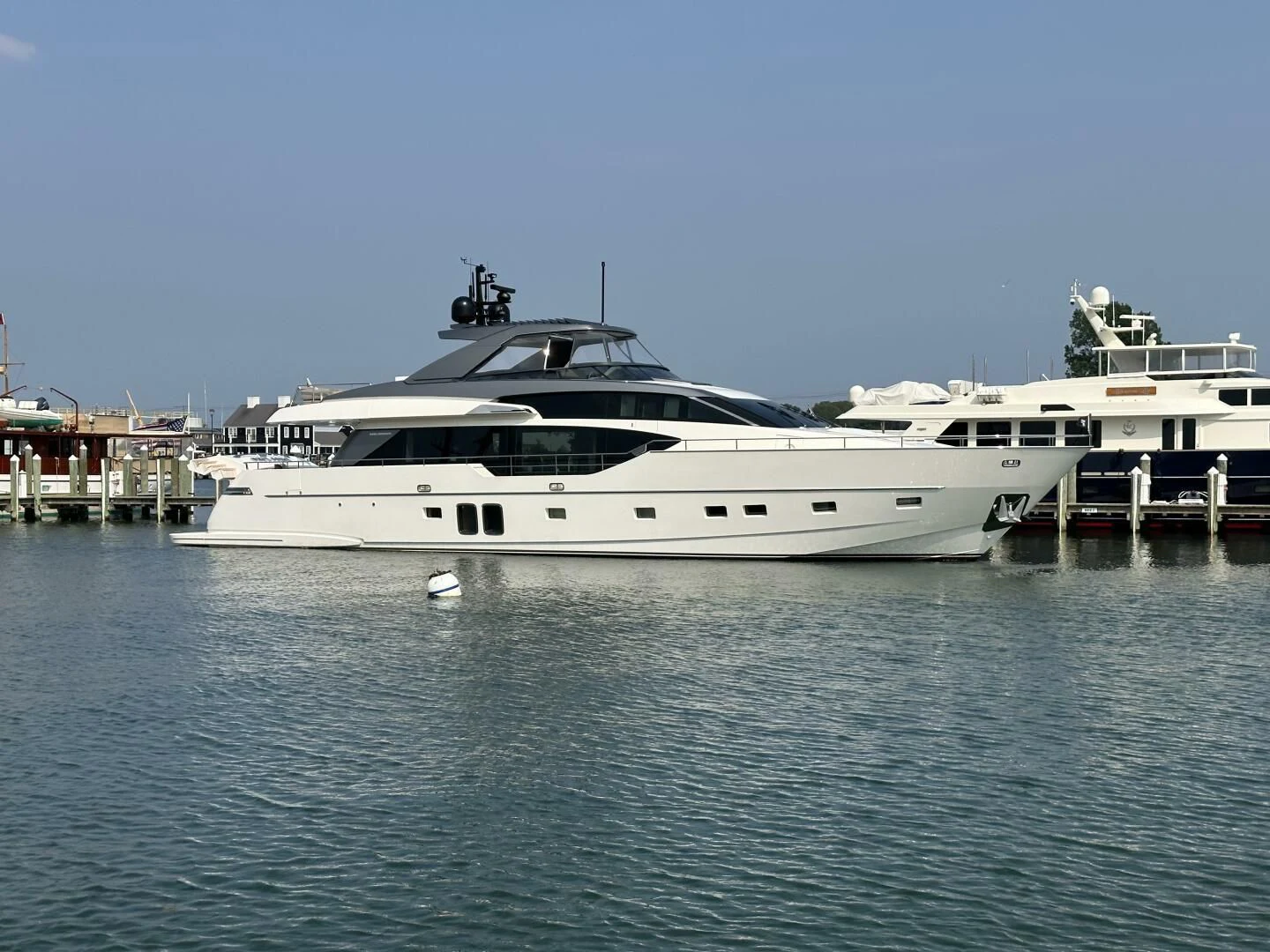 a white yacht in the water aboard JUJU Yacht for Sale