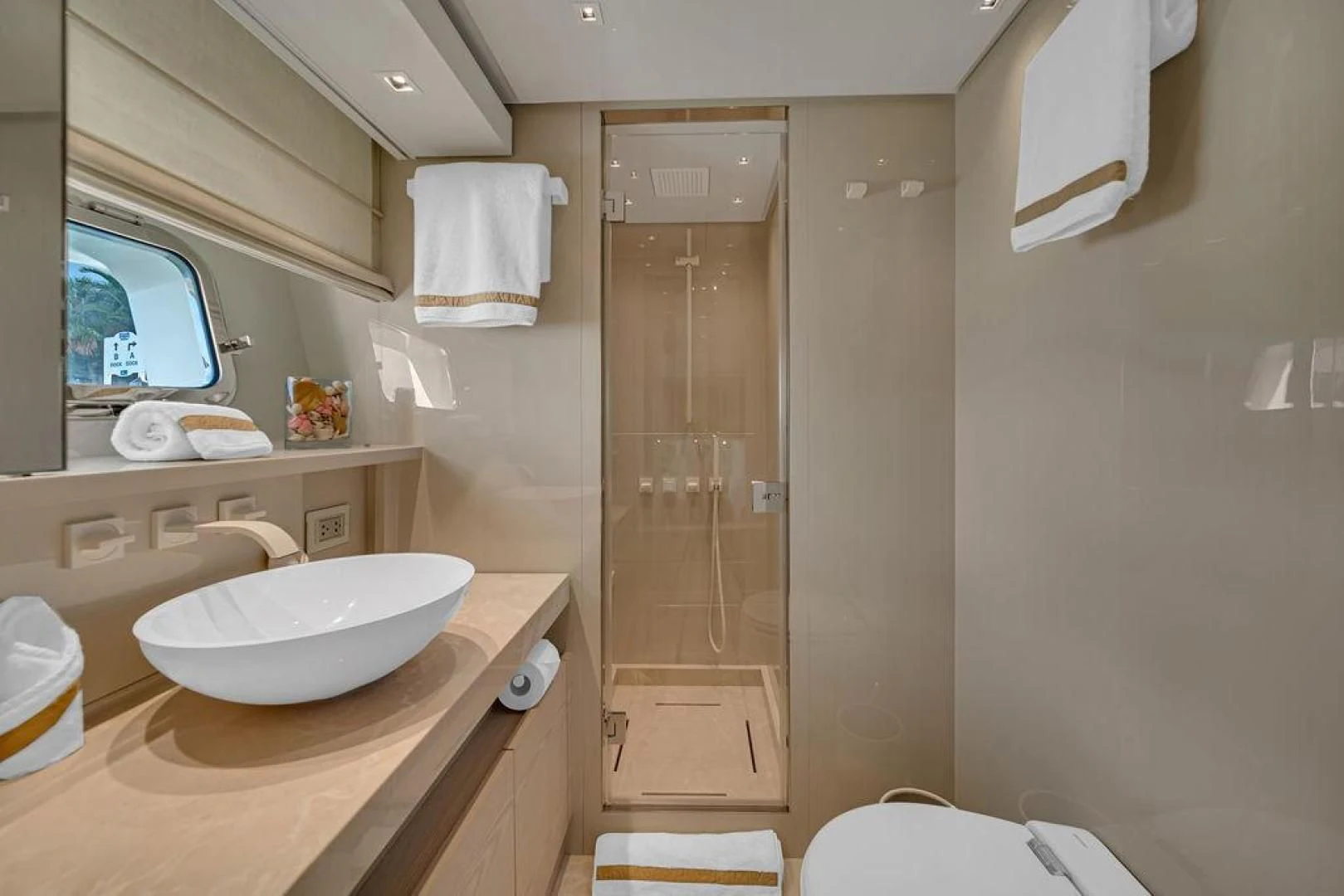 a bathroom with a sink and a shower aboard JUJU Yacht for Sale