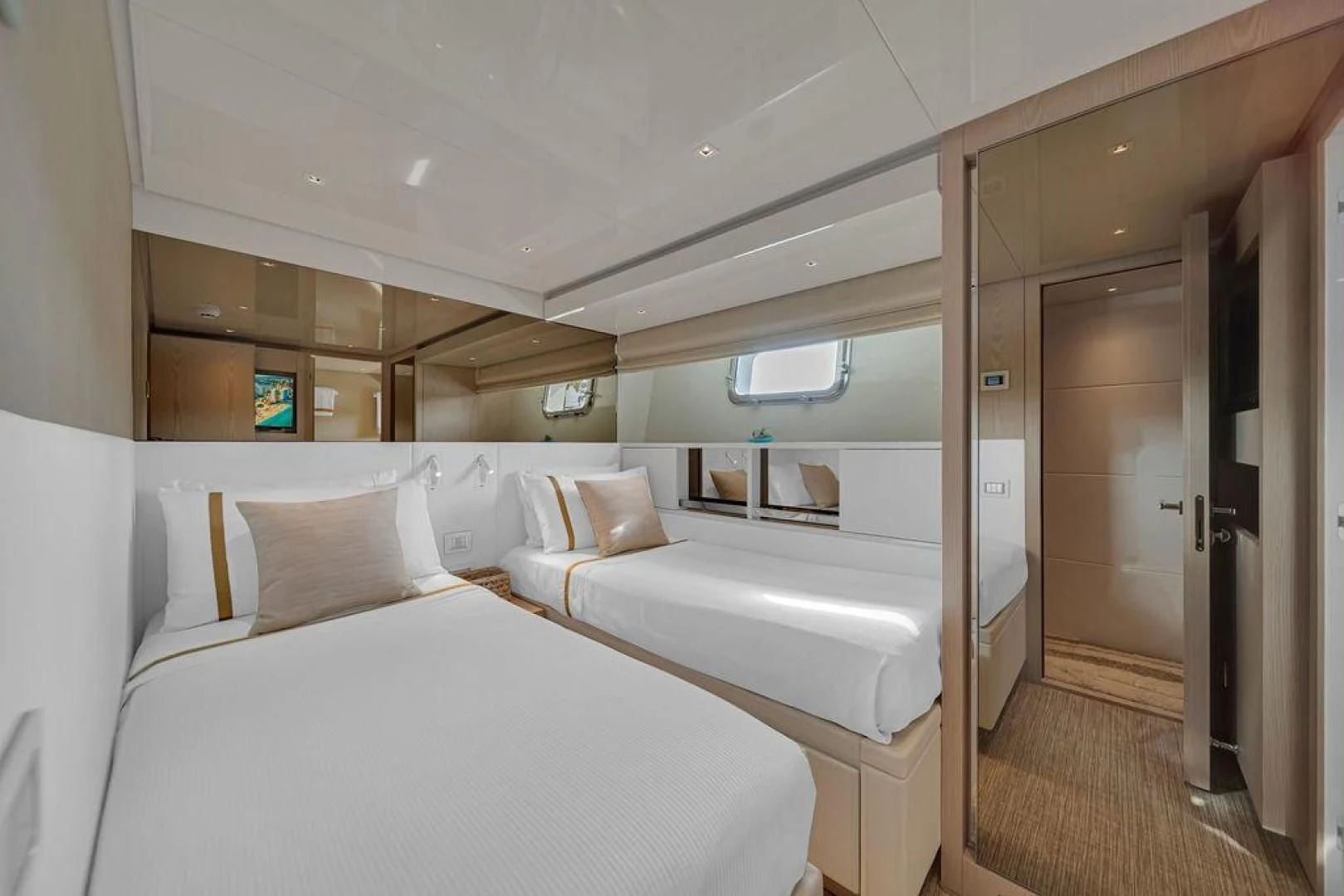 a room with two beds aboard JUJU Yacht for Sale