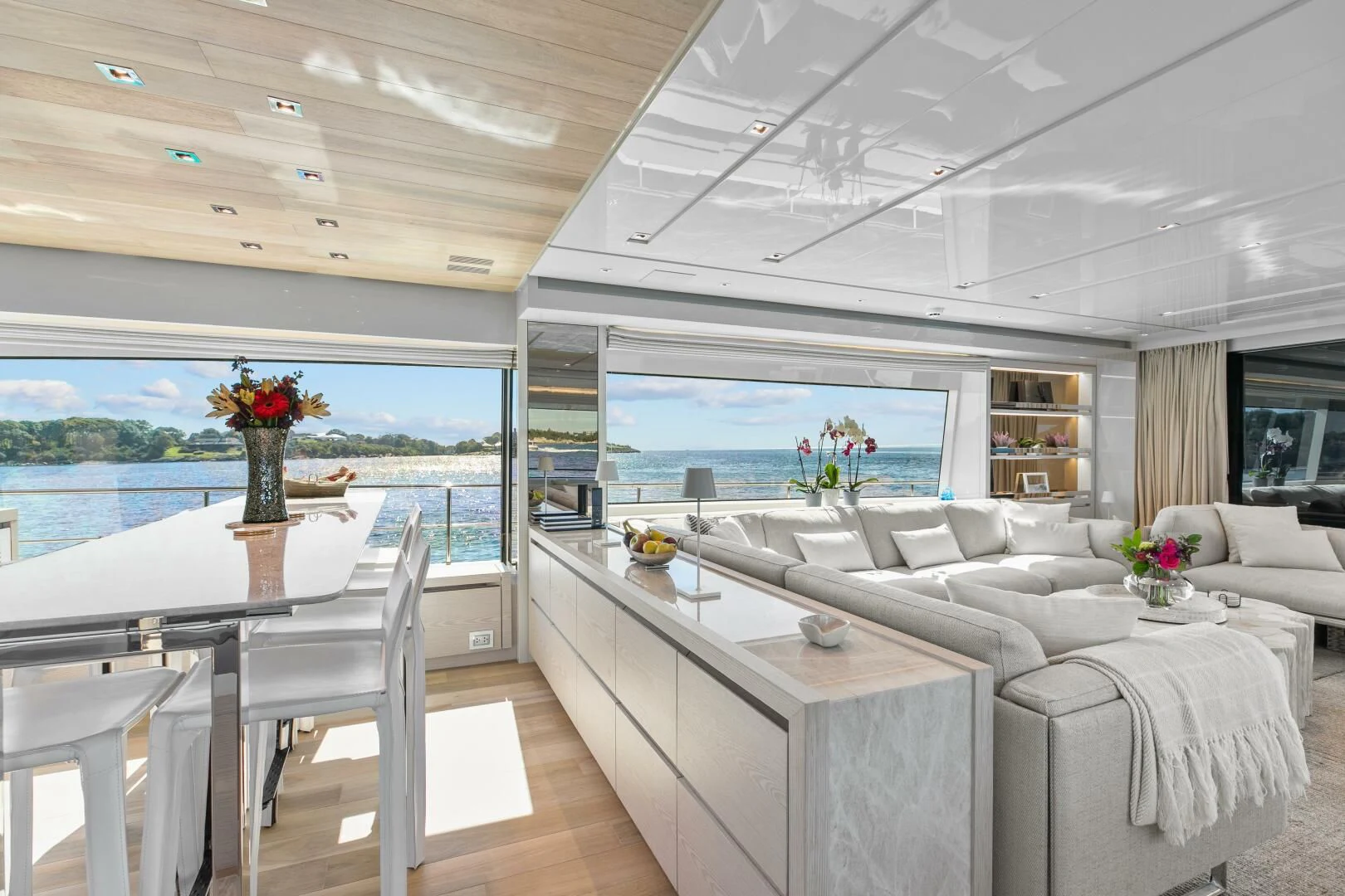 a large living room with a large window aboard JUJU Yacht for Sale