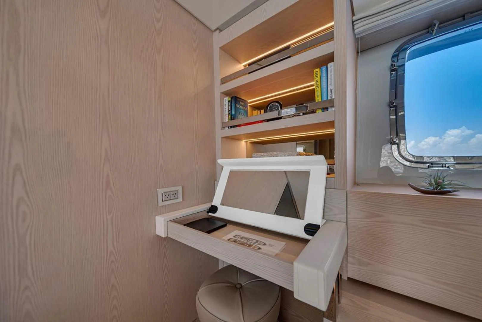 a room with a desk and a computer aboard JUJU Yacht for Sale