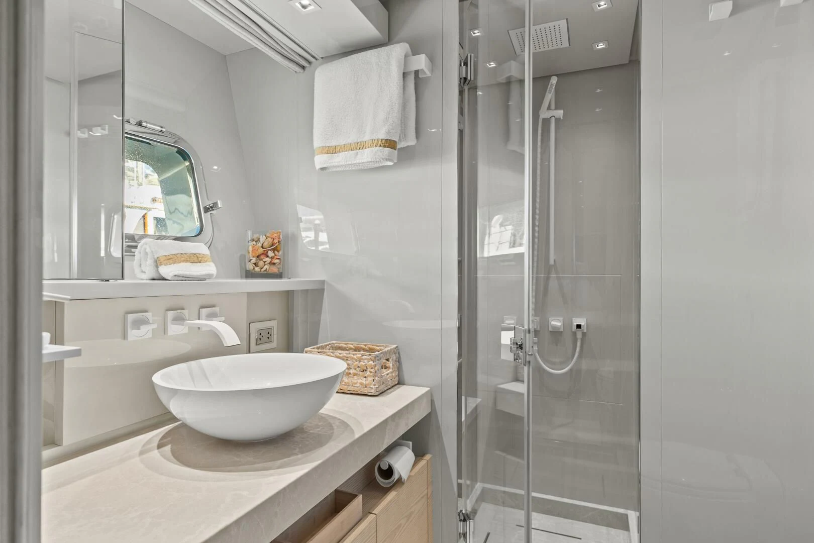 a bathroom with a sink and a shower aboard JUJU Yacht for Sale