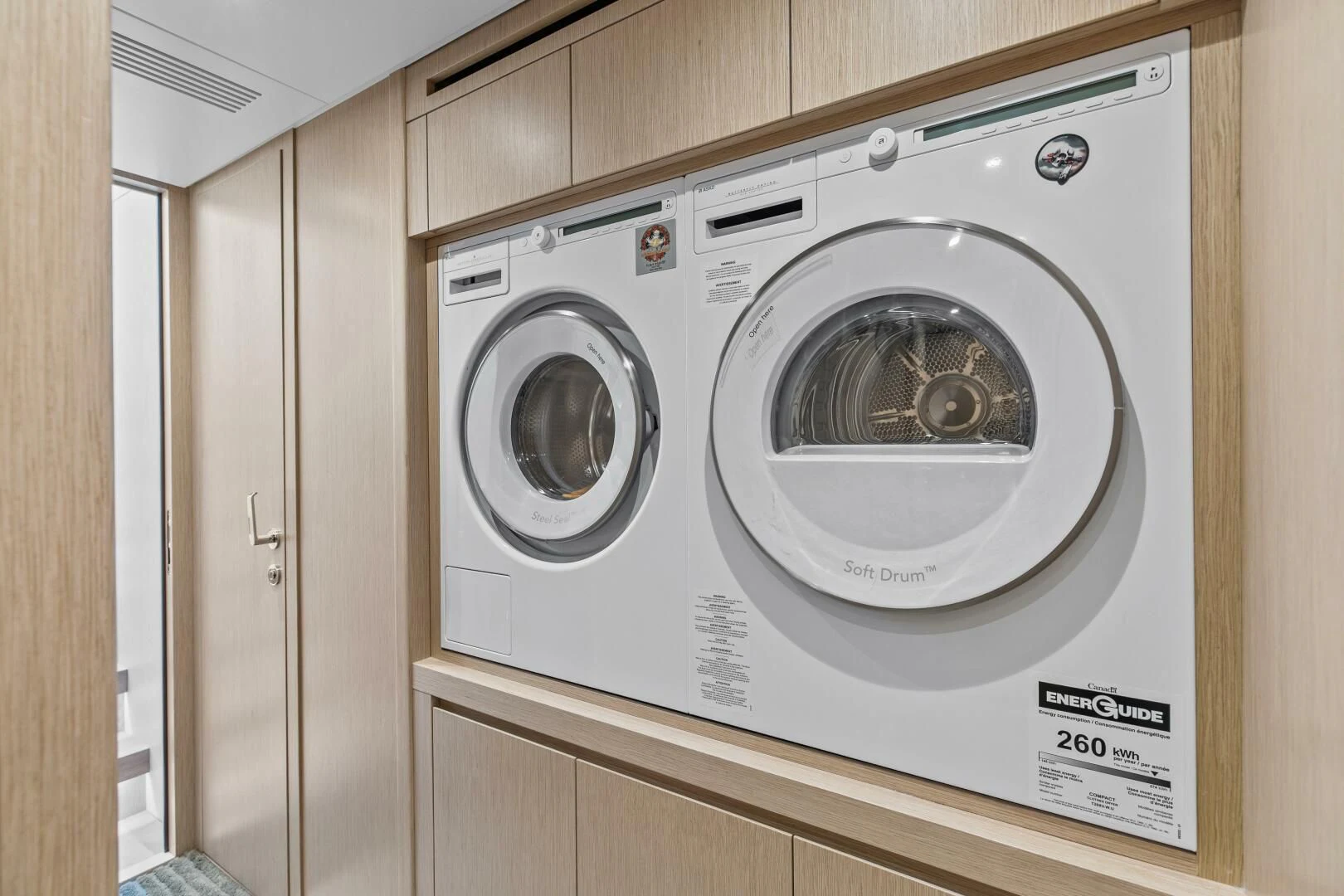 a white washing machine aboard JUJU Yacht for Sale
