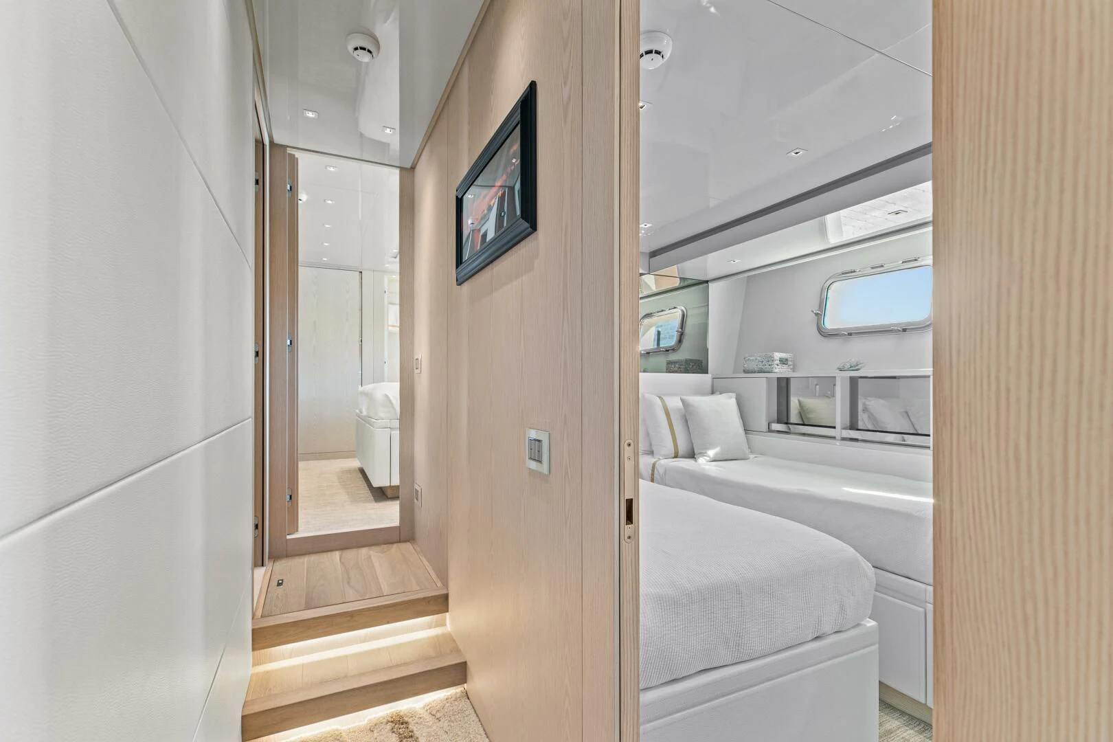 a room with a television and a bed aboard JUJU Yacht for Sale