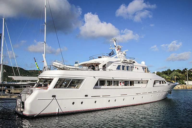 a white boat with a sail aboard STAR OF THE SEA Yacht for Sale