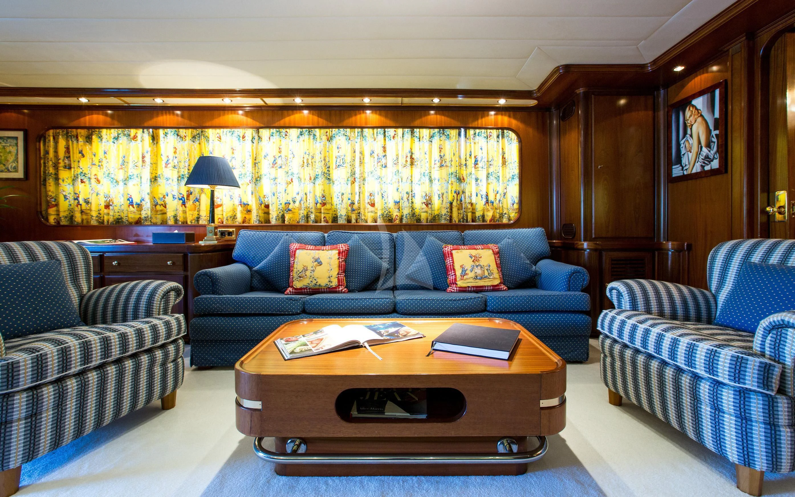 a living room with a couch and a coffee table aboard STAR OF THE SEA Yacht for Sale