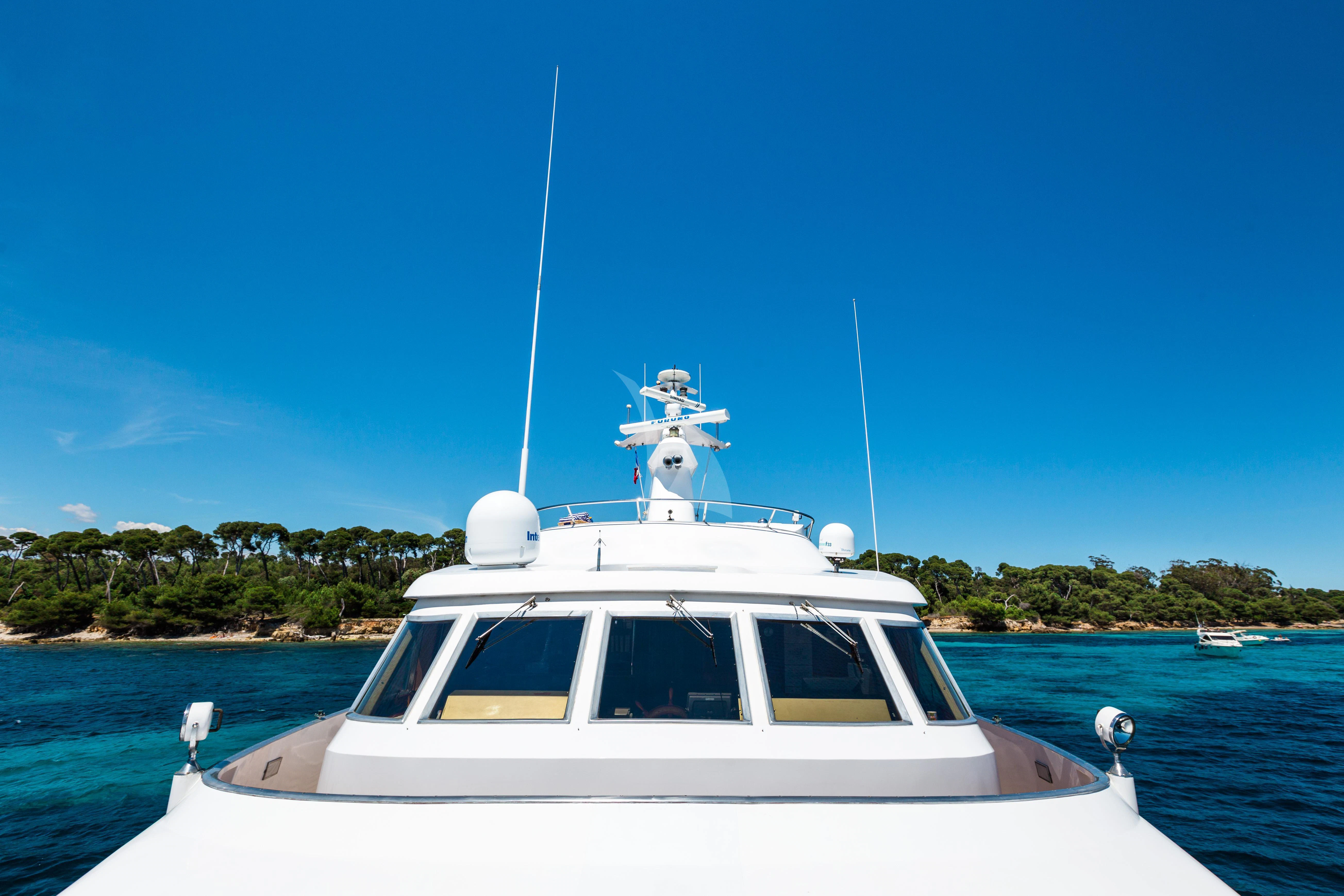a white boat on water aboard STAR OF THE SEA Yacht for Sale