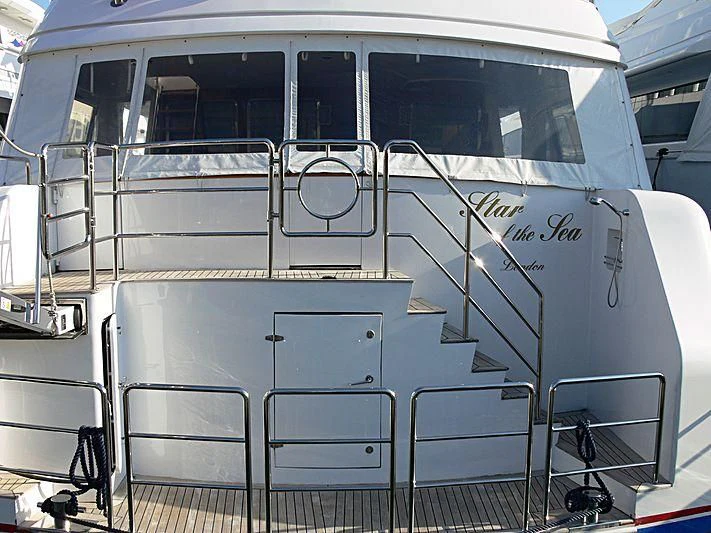a white train with metal doors aboard STAR OF THE SEA Yacht for Sale
