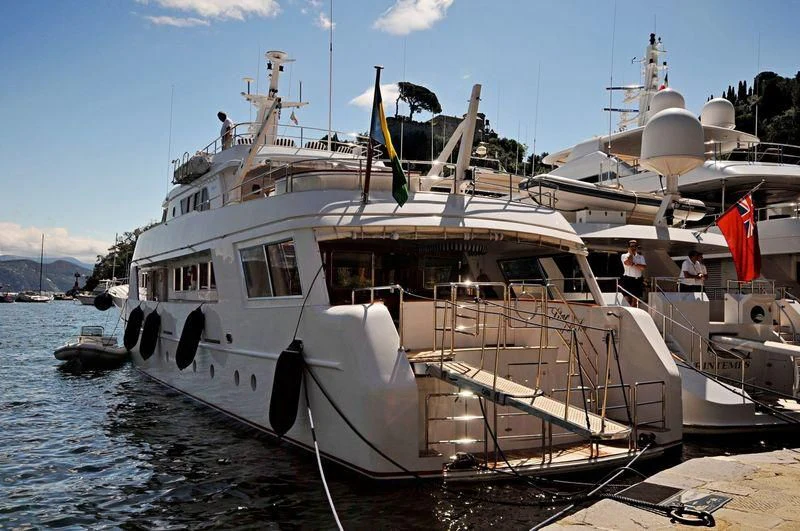 a boat docked at a pier aboard STAR OF THE SEA Yacht for Sale