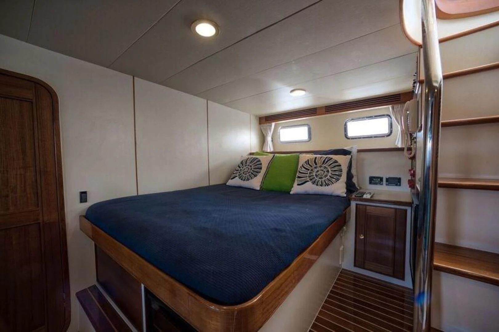 a bed in a room aboard GRACIE Yacht for Sale
