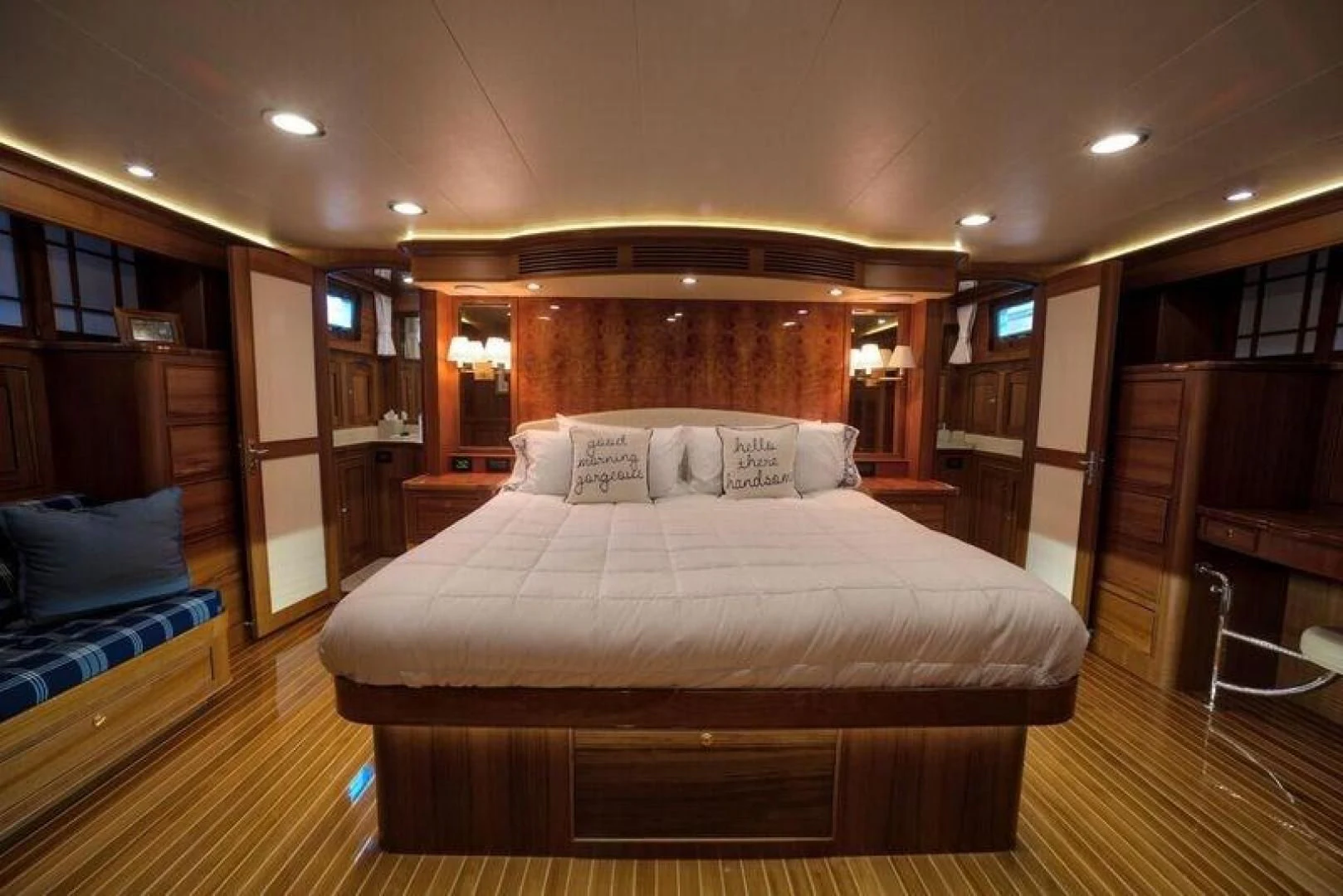 a large bed in a hotel room aboard GRACIE Yacht for Sale
