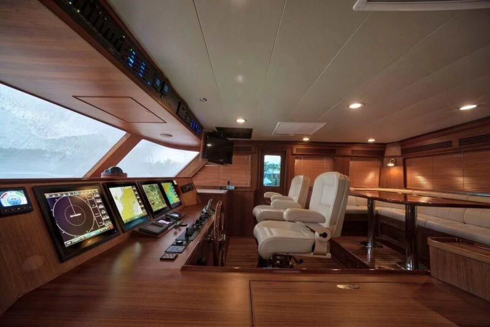 a room with a wood floor and a large window with a wood floor aboard GRACIE Yacht for Sale