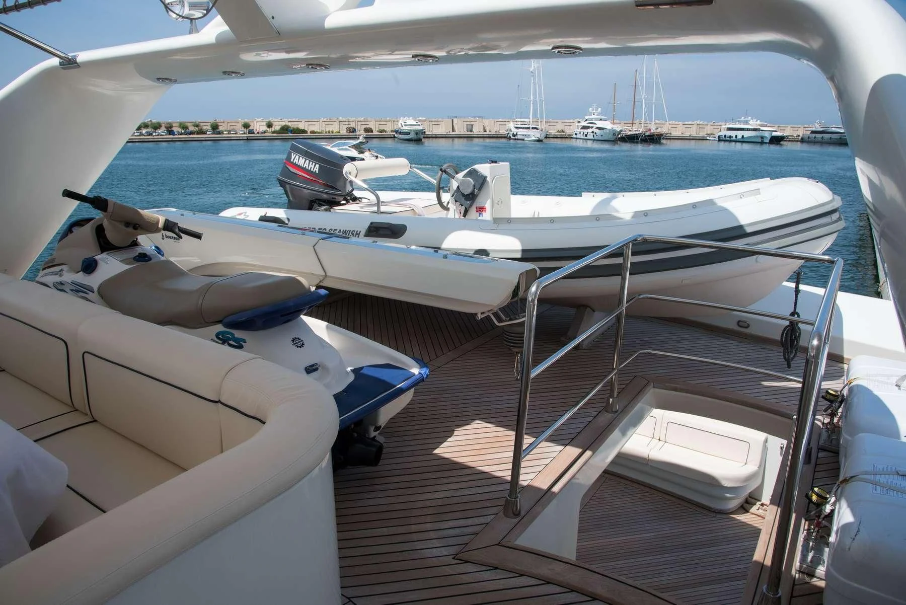 a boat with a deck and a deck with boats on it aboard ANNE MARIE Yacht for Sale