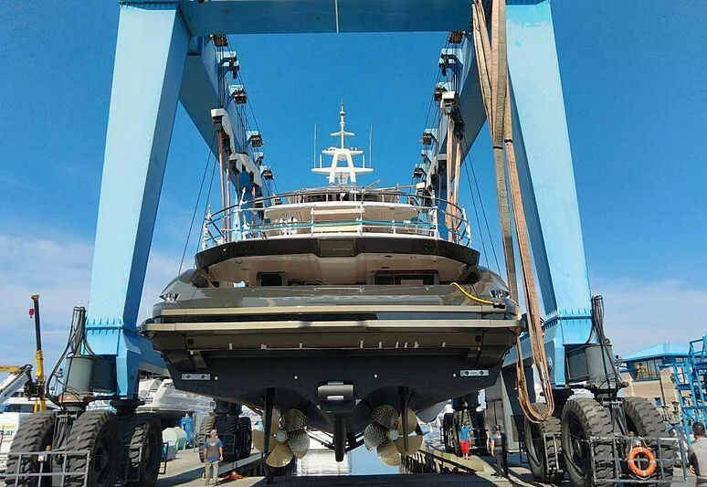 a large ship in a harbor aboard NG Yacht for Sale