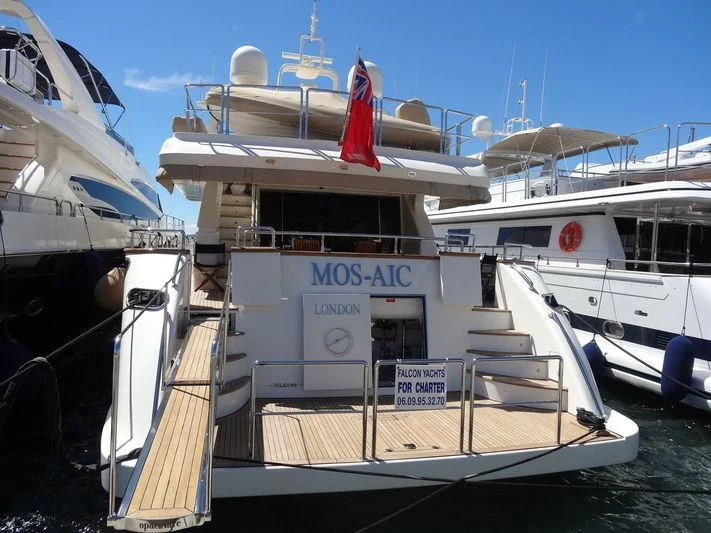 a boat docked at a pier aboard MOS-AIC Yacht for Sale